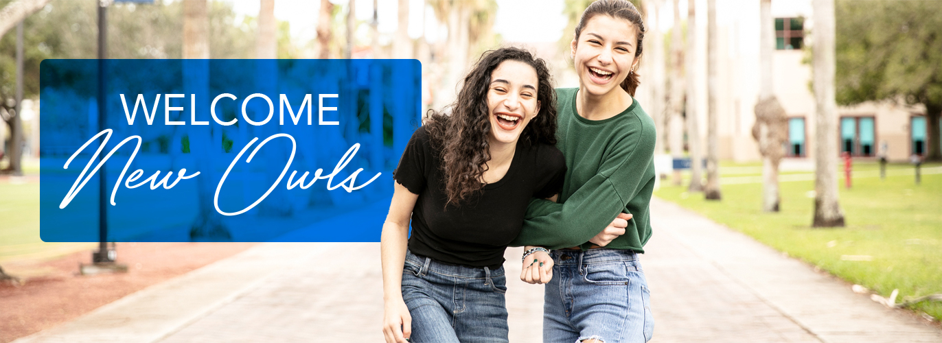 Two female students laughing