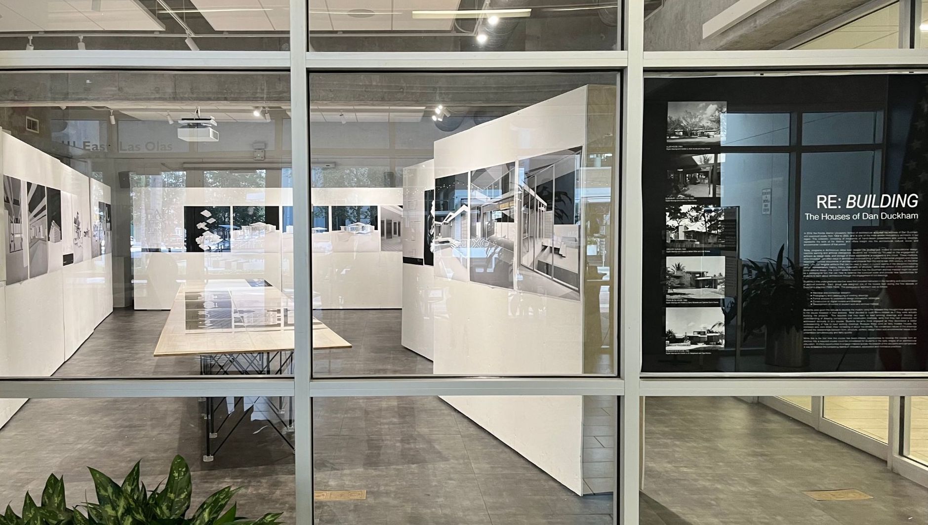 Exhibit installation of original working drawings from the Dan Duckham Archives and original digital models produced by 太阳城娱乐 School of Architecture students