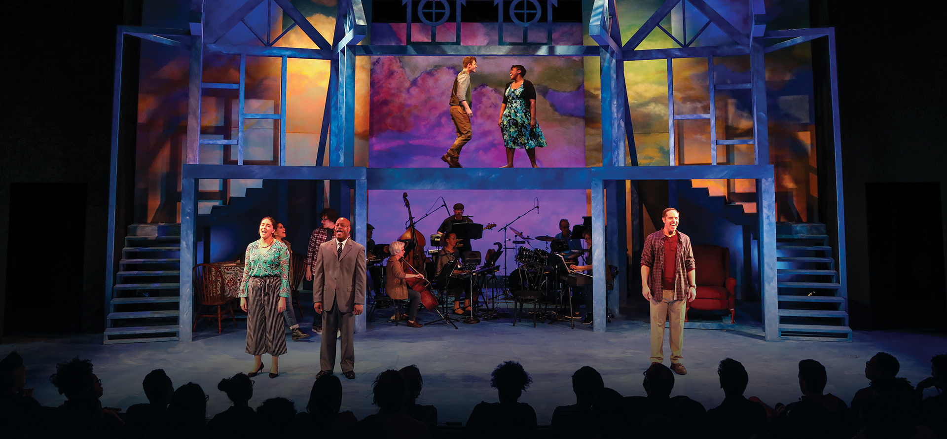 Actors performing in a musical