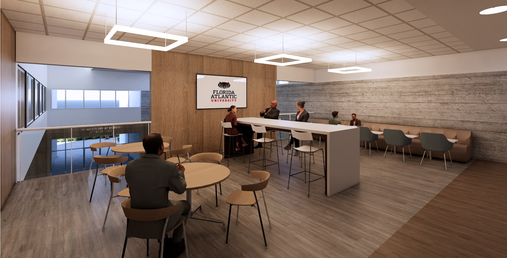 People sitting in a lounge with the 太阳城娱乐 logo in the background