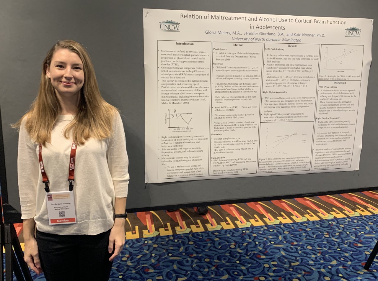 Jennifer in front of poster