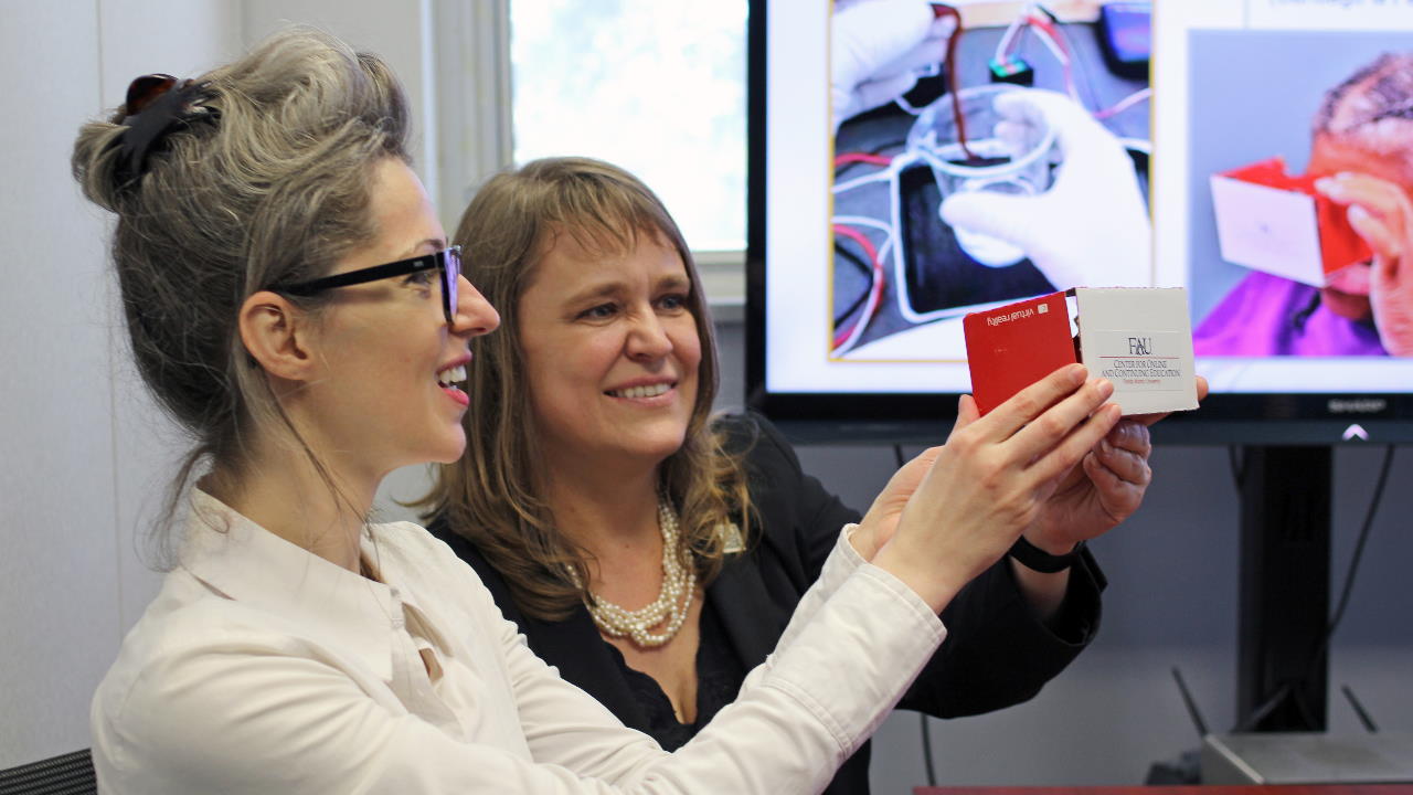 Image of two team members