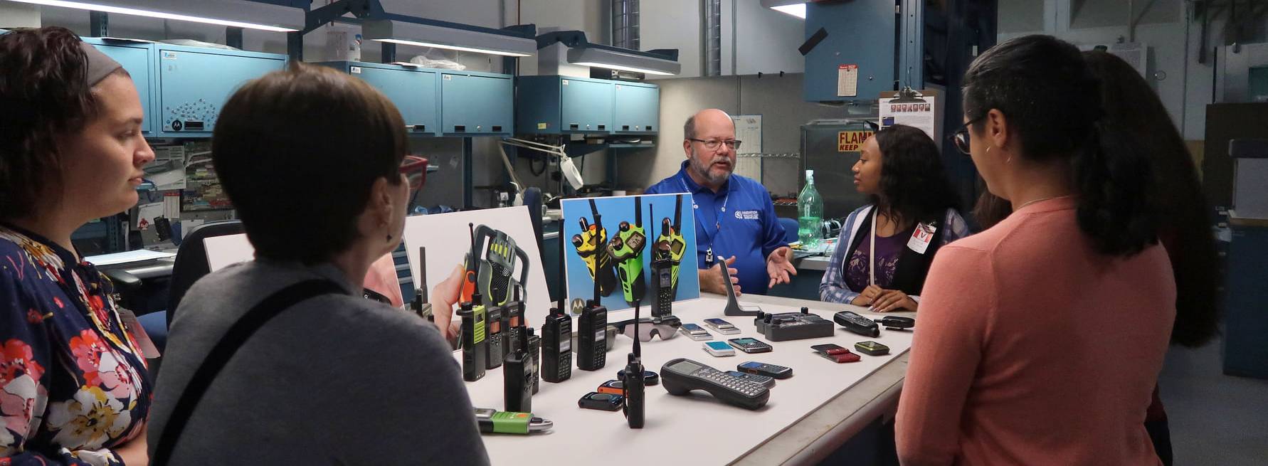 Woman in air traffic control room.