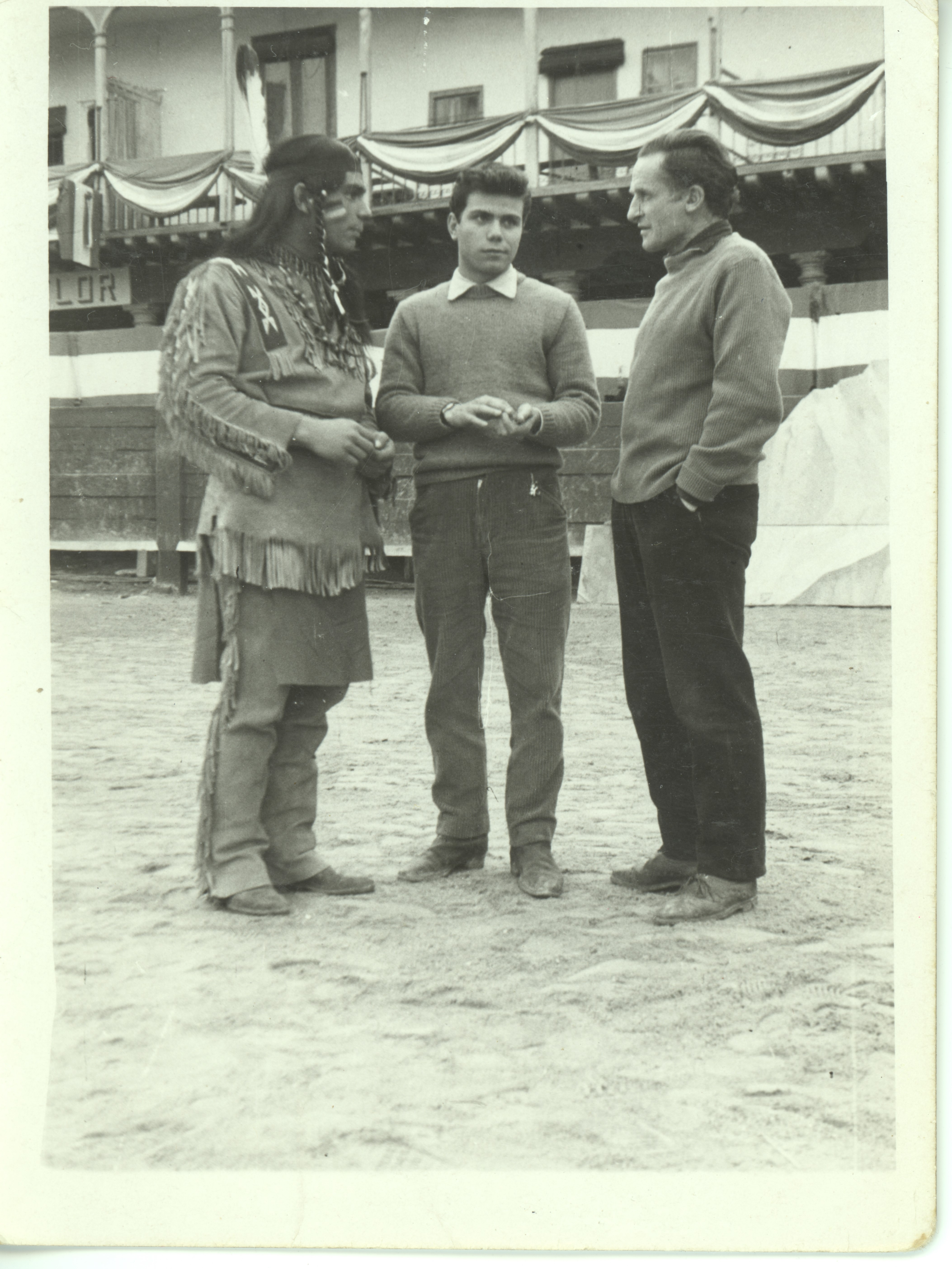 Assistant producer Francisco Rodríguez in the middle, with Enrique Santiago García (“El Cacharra”) on his right.  Movie: Circus World, 1964. Dir. Henry Hathaway, with John Wayne and Rita Hayworth Claudia Cardinale. Location: Main Square of Chinchón, Madrid.