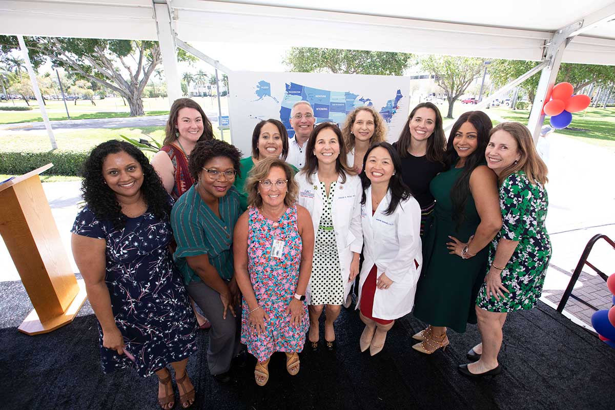 M.D. Student Admissions staff with Senior Associate Dean Caceres