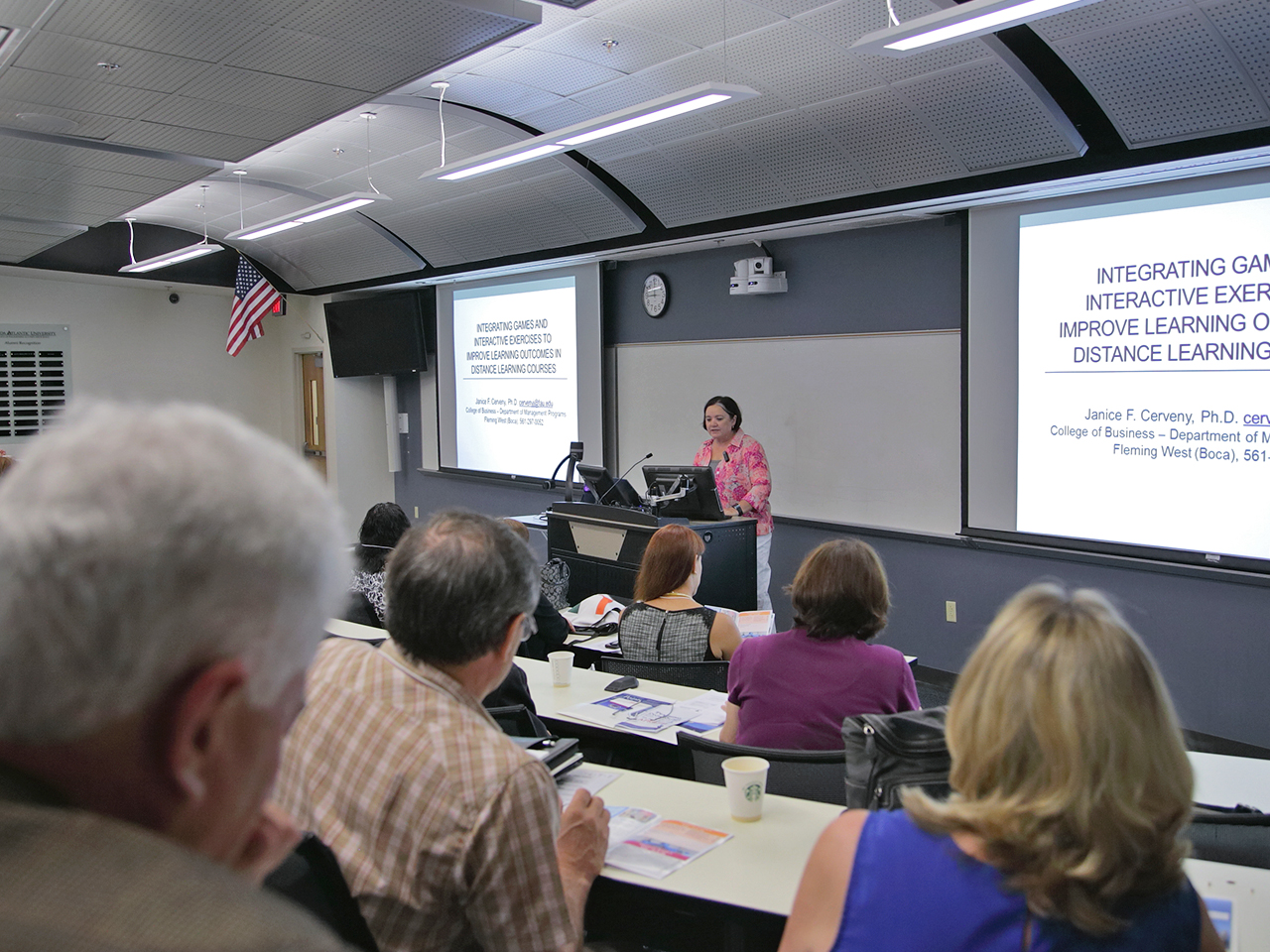 one faculty sitting next to an instructional designer