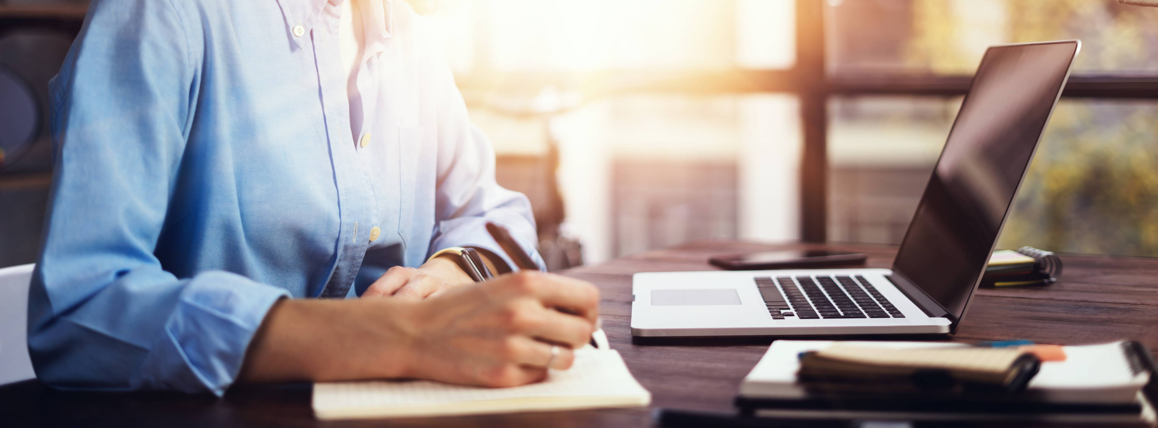 A Student writing on a paper