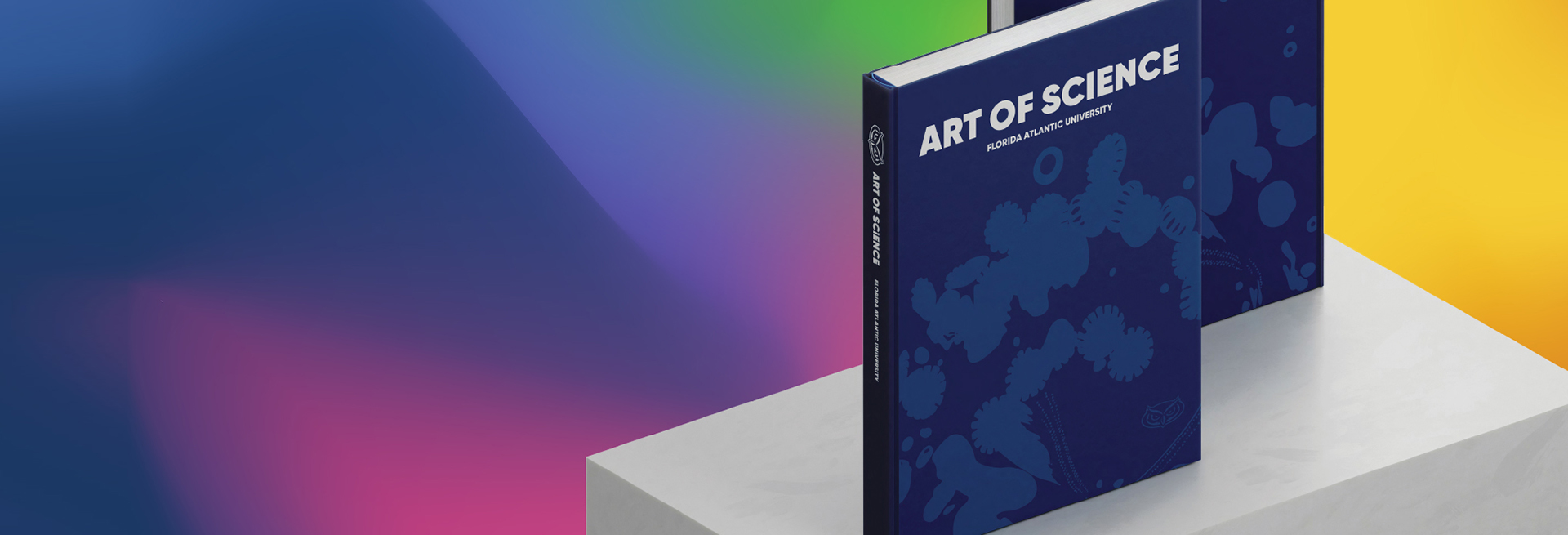 Book titled 'Art of Science' from 太阳城娱乐 with abstract blue scientific patterns on the cover.