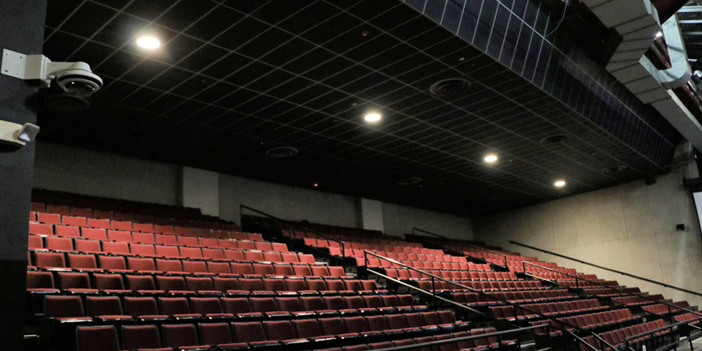 Empty auditourium chairs