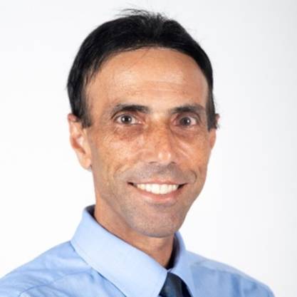Professional headshot photo of Kenneth Dion