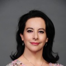 Professional headshot photo of Alejandra Quintero