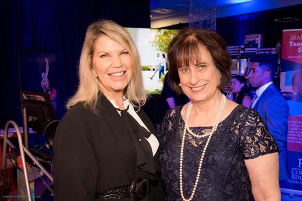 Tracy Boulukos, AVP Financial Aid & New Student Services Initiatives, and Michele Hawkins, Ph.D., MSW, interim provost and social work professor